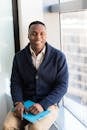 pexels-photo-1181391-1181391 Man Wearing Blue Button-up Sweater